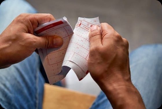 A person reviewing a printed screening form