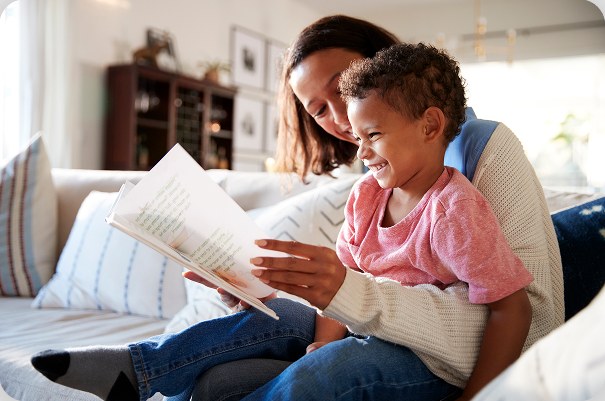 A parent and child reading together