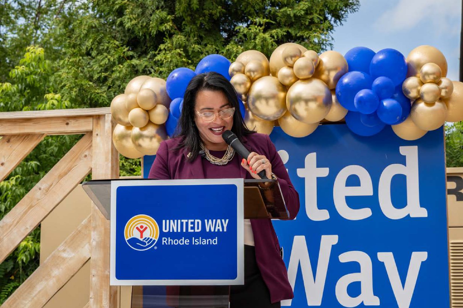 A speaker addressing a community event