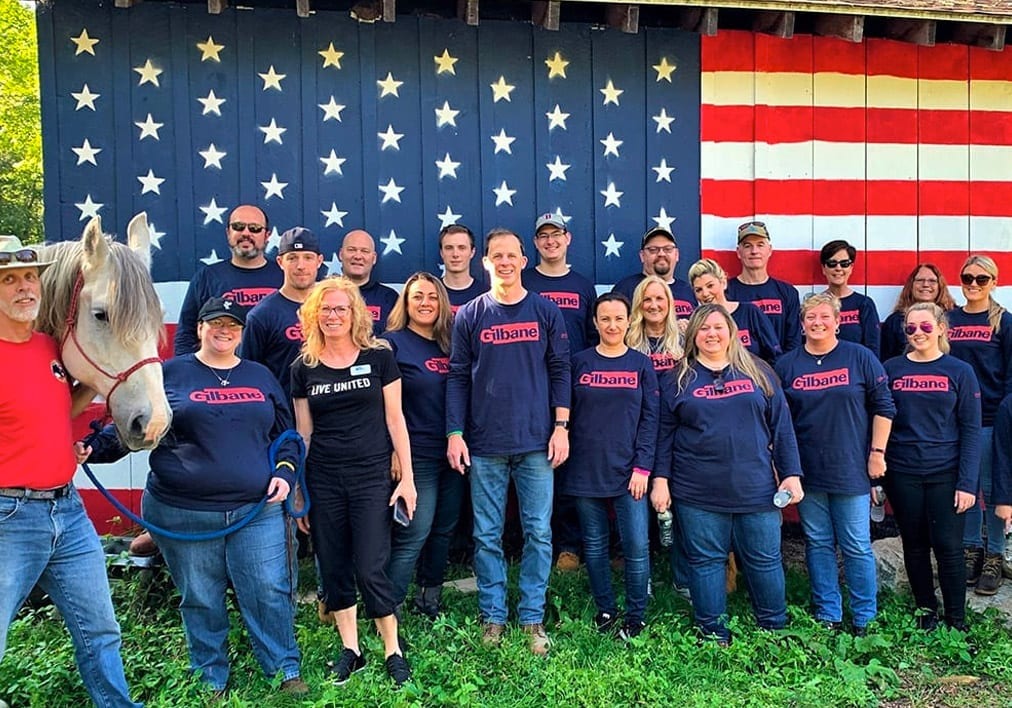 A workplace team gathered for a United Way campaign